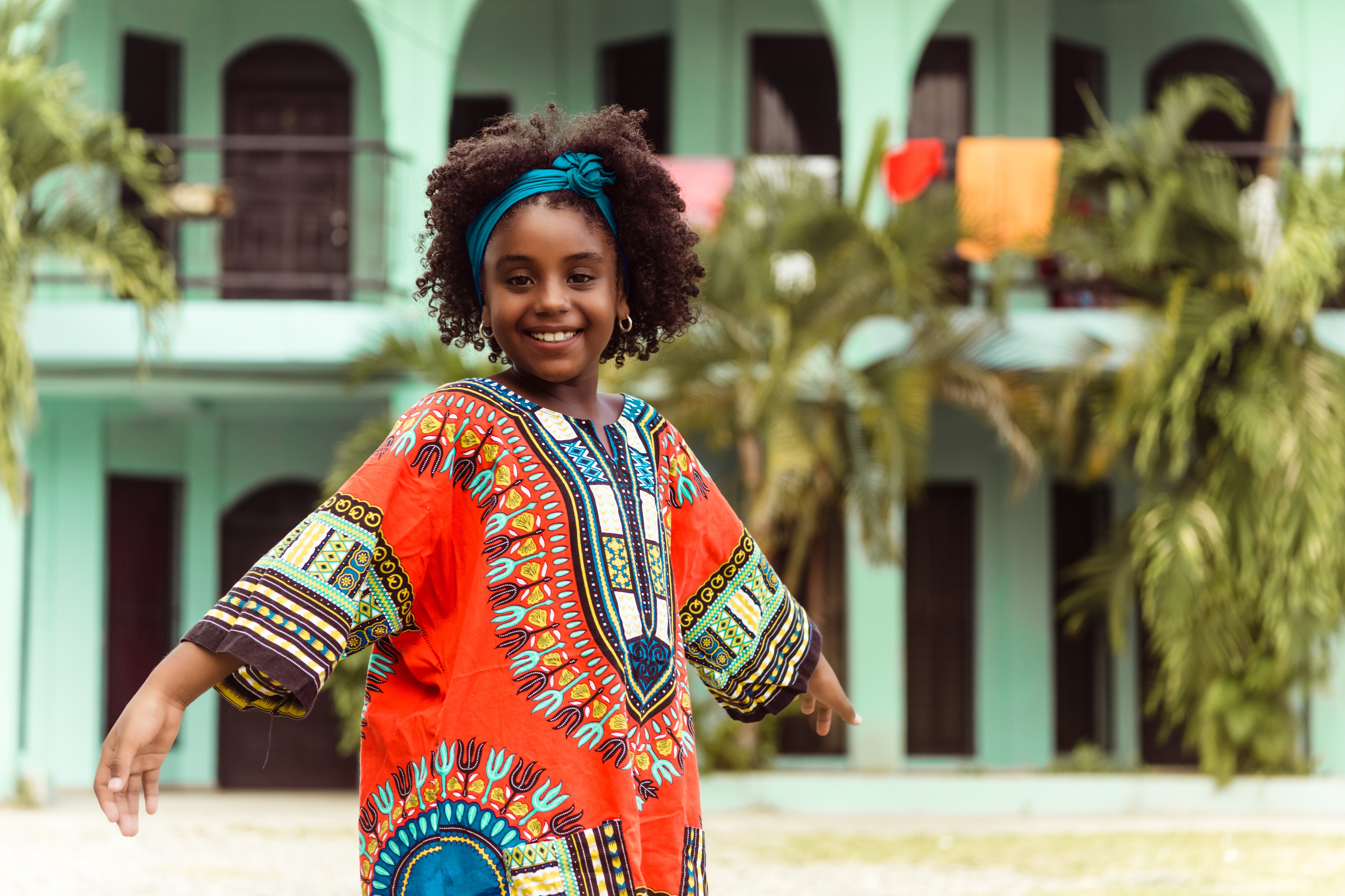 Girl in colorful dashiki celebrating culture